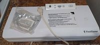 FoodSaver V2040 sealer with hose and power cord