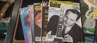 Stack of five Guitar Player magazines showing assorted covers