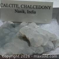 Specimen in box with label showing origin