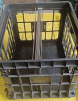 Black plastic crate style file tote with hanging folders