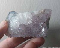 Front view of the amethyst cluster showing crystal faces