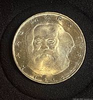 Obverse showing Karl Marx portrait, legends "KARL MARX" and date 1818
