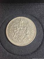 Reverse showing Canadian Coat of Arms and 1976 date