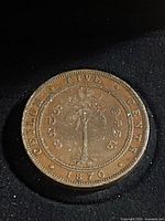 Reverse of 1870 Ceylon 5 Cents coin showing palm tree, denomination and date
