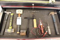 Drawer view showing various hammers, mallets, rivet tool, and hand tools arranged flat