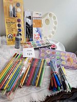 Group view of art supplies on table