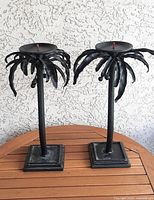 Both candle holders full view on table