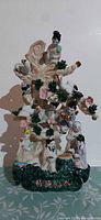 full view of porcelain fortune tree figurine