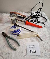 Group shot showing all seven stained glass tools and supplies