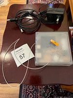 Hub, power adapter, USB cable and connector displayed together