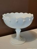 Side view showing scalloped rim and teardrop nodes