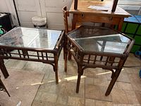 Rectangular and hexagonal rattan side tables side-by-side