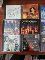 Front view of first six CDs showing titles and cover art