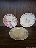 All three plates front view