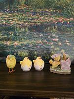 All five chick figurines displayed together