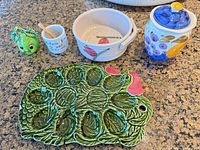 overview of all five ceramic pieces on countertop