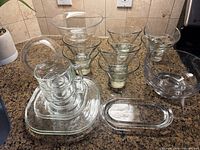 All clear glass pieces grouped on countertop