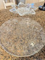 Round platter and star bowl on countertop