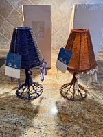 Pair of beaded mini lamps with tags visible