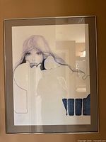 Overall view of framed blue-toned female portrait print showing artwork, mat, frame, and glass