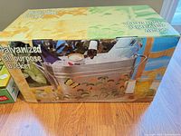 Retail box showing galvanized floral bucket in use