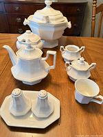 Group shot of all seven ironstone pieces on table