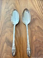 Two silverplate serving spoons full view