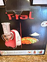 Retail box front showing product image and brand