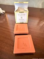 Box with two square tea trays top view