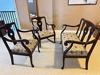 Full view of armchair, rocking chair and loveseat showing matching design and upholstery