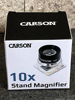 Front of sealed Carson 10x stand magnifier retail box