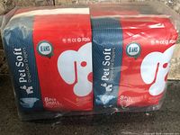 Front view of two sealed packs showing brand, jeans style and packaging