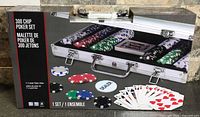 Retail box for 300 chip poker set showing aluminum case with chips, cards, dealer button