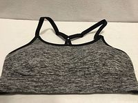 Front view of grey heather Champion sports bra
