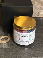 Jar with lid and box front view