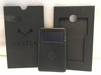 Front view of Ekster Tracker Card with sleeve and inner tray