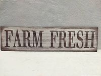 Front view of Farm Fresh sign showing wording and finish