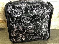 Front view showing floral pattern and brand label