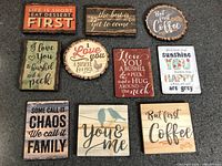All ten wooden quote magnets laid out