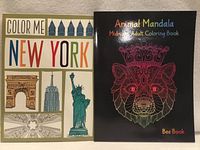 Front covers of both coloring books: Color Me New York and Animal Mandala Midnight