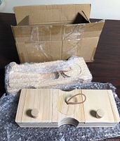 Both wooden treat boxes with packaging