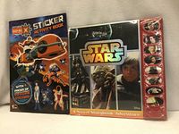 Front view of both books: Star Wars sound storybook sealed, Generator Rex sticker activity book