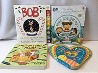 Front view showing all four books upright