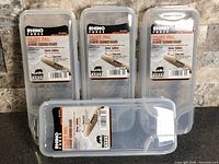 Four Rhino Force Paint Pal brush cases front view with labels