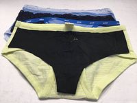 Stack of five assorted Aerie underwear showing colors and styles