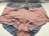 Stacked view showing striped Voglio brief over other pairs