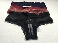 Three assorted lace panties black, burgundy floral, navy
