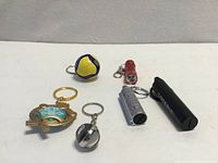 Group shot of all six keychains