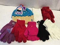 Overall view of beanie and seven gloves