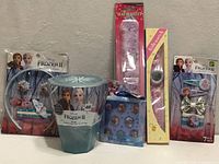 Group shot of all six sealed items